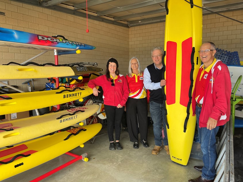 Club President Kelly Buttle, Club life members Kathleen Donovan, Southern Ports Regional Manager - Esperance Scott Bates, Club life member Graham Donovan with the new racking at Esperance Goldfields Life Saving Club on Twilight Beach.